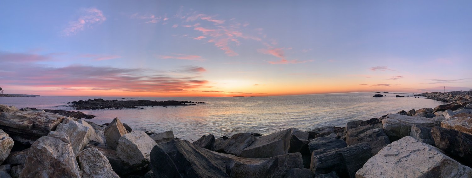Sunrise over the rocky shoreline of the New Hampshire Seacoast